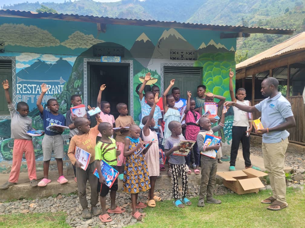 Distributing school materials at the community office